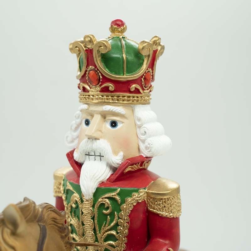 Schiaccianoci Natalizio in Resina su Cavallo a Dondolo