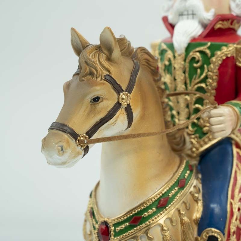 Schiaccianoci Natalizio in Resina su Cavallo a Dondolo