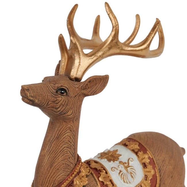 Renna Natalizia Seduta in Resina H.19 cm